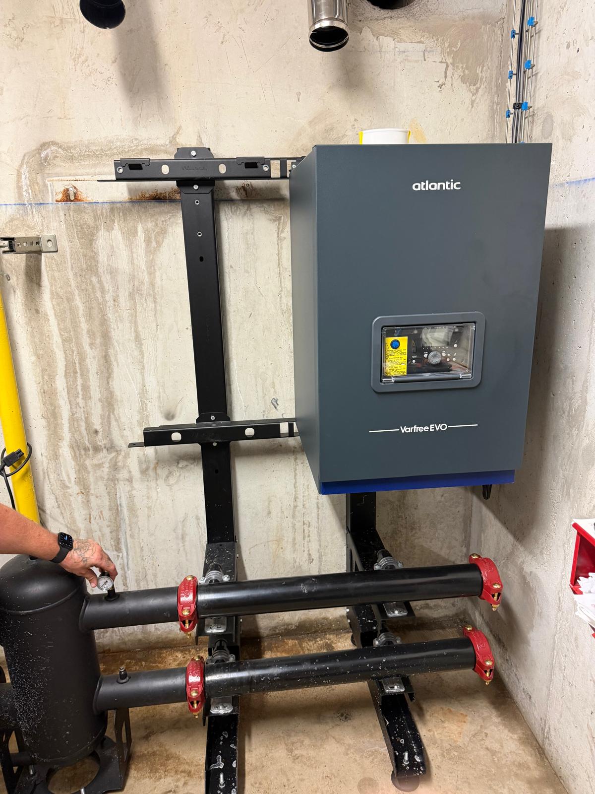 Mise en service et réglage de la combustion à l'analyseur sur la chaufferie gaz collective rénovée